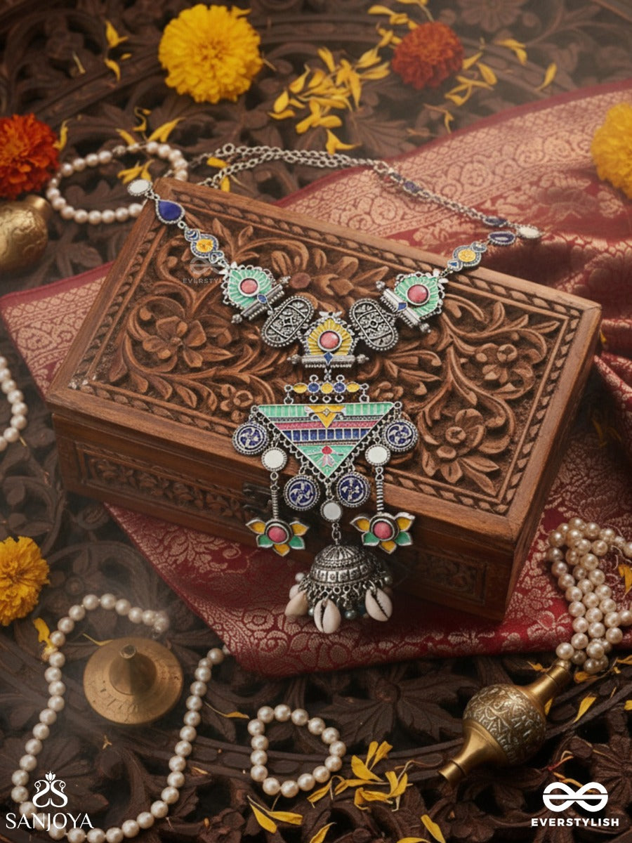 Rangapadma-Color Bloom- Enamelled Neckpiece With Cowrie Shells,Mirror And Colorful Gemstones On Oxidized Metalwork.
