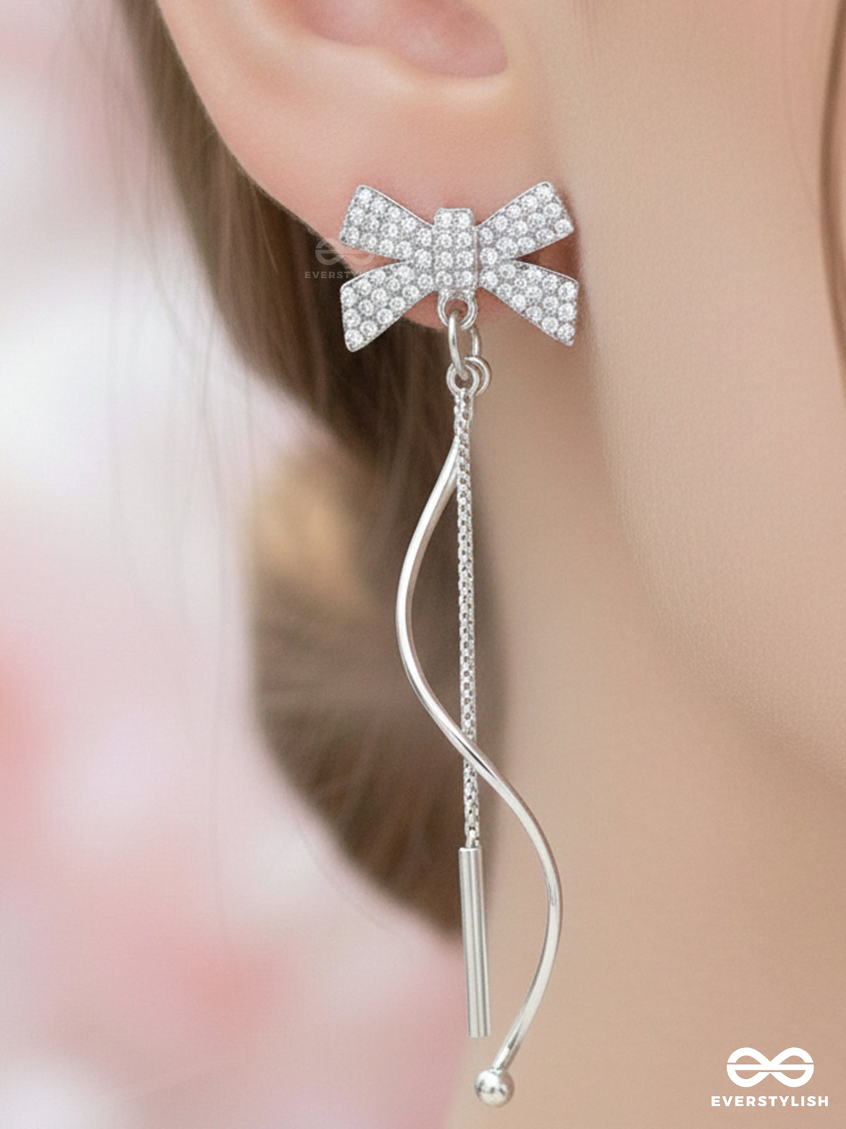 Starry Knots- Dangling Silver Cubic Zirconia Earrings