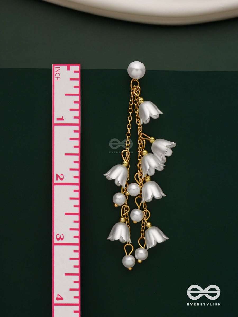 Strings Of Promise - Metallic Dangling White Rose Earrings