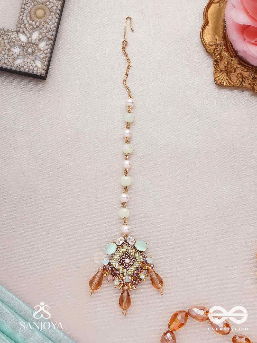 Sundara Shobha - Beautiful Radiance- Elegant Mangtika Surrounded By Sparkling Stones, Delicate Pearls And Light Green Beads