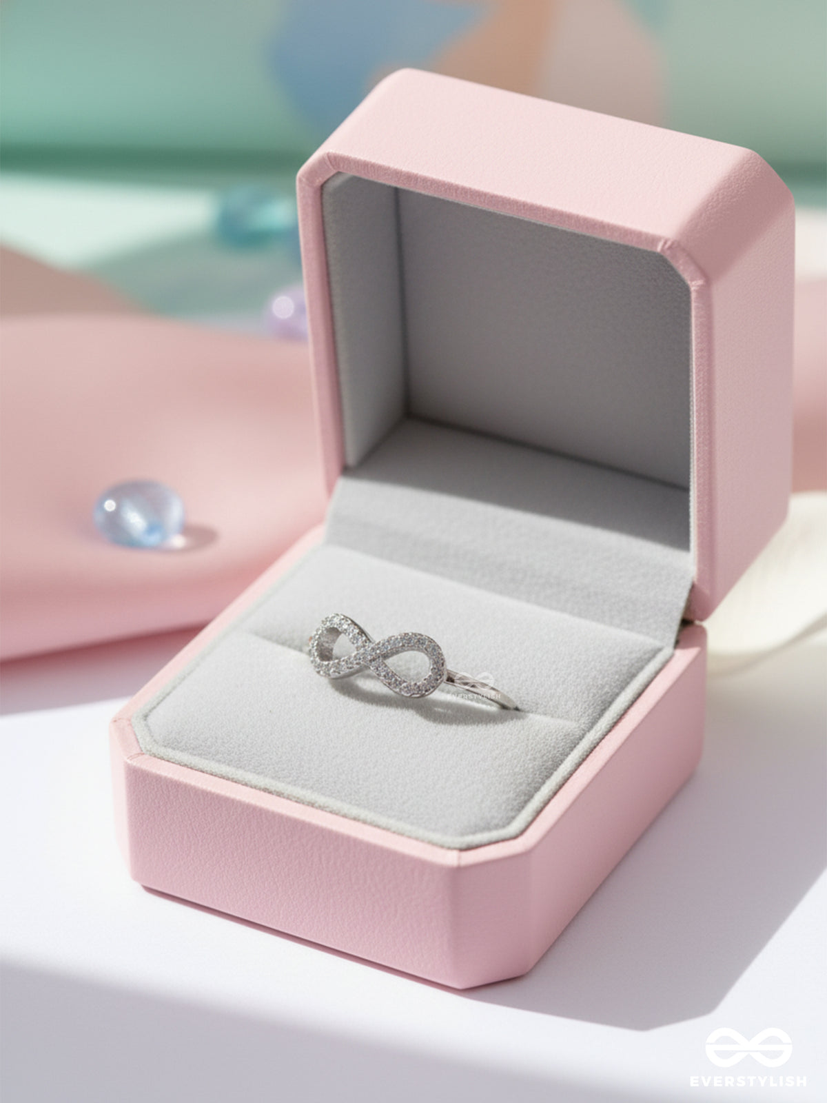 Infinite Lustre- Dainty And Elegant Infinity Band With CZ Stones