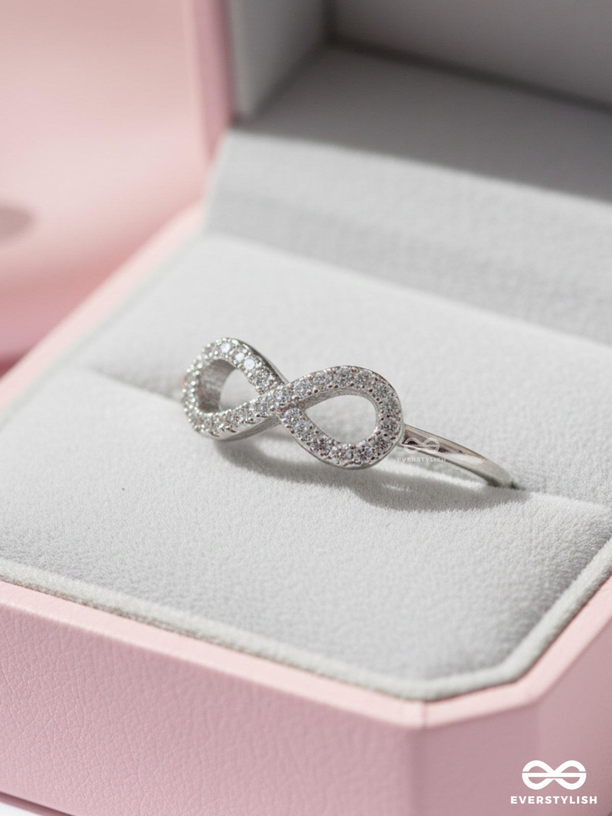 Infinite Lustre- Dainty And Elegant Infinity Band With CZ Stones