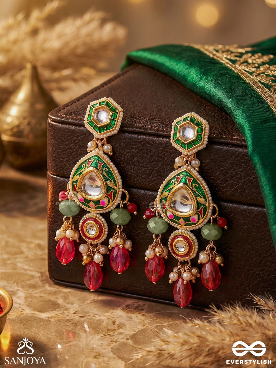 Manitarika - Jewelled Star - Decorative Earrings With Teardrop Design And Ruby Drop Accents