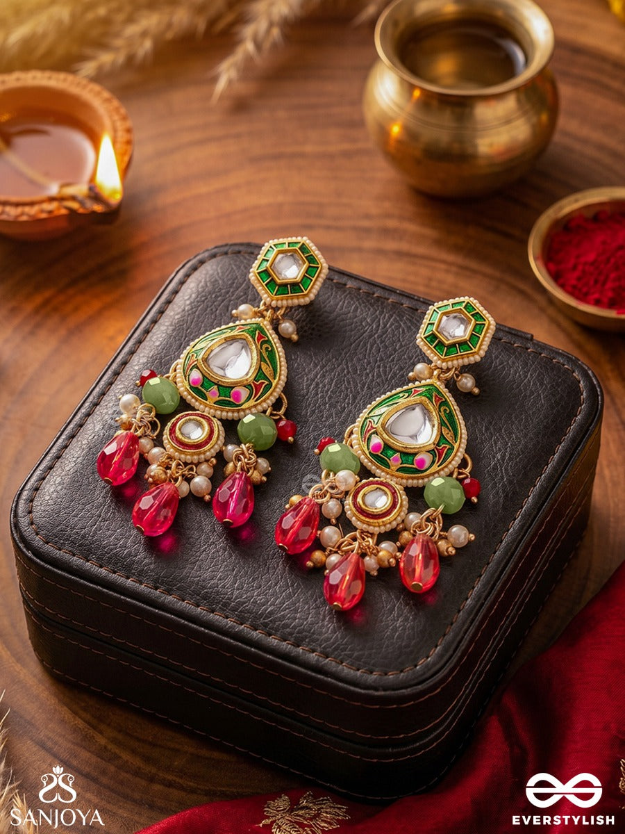 Manitarika - Jewelled Star - Decorative Earrings With Teardrop Design And Ruby Drop Accents