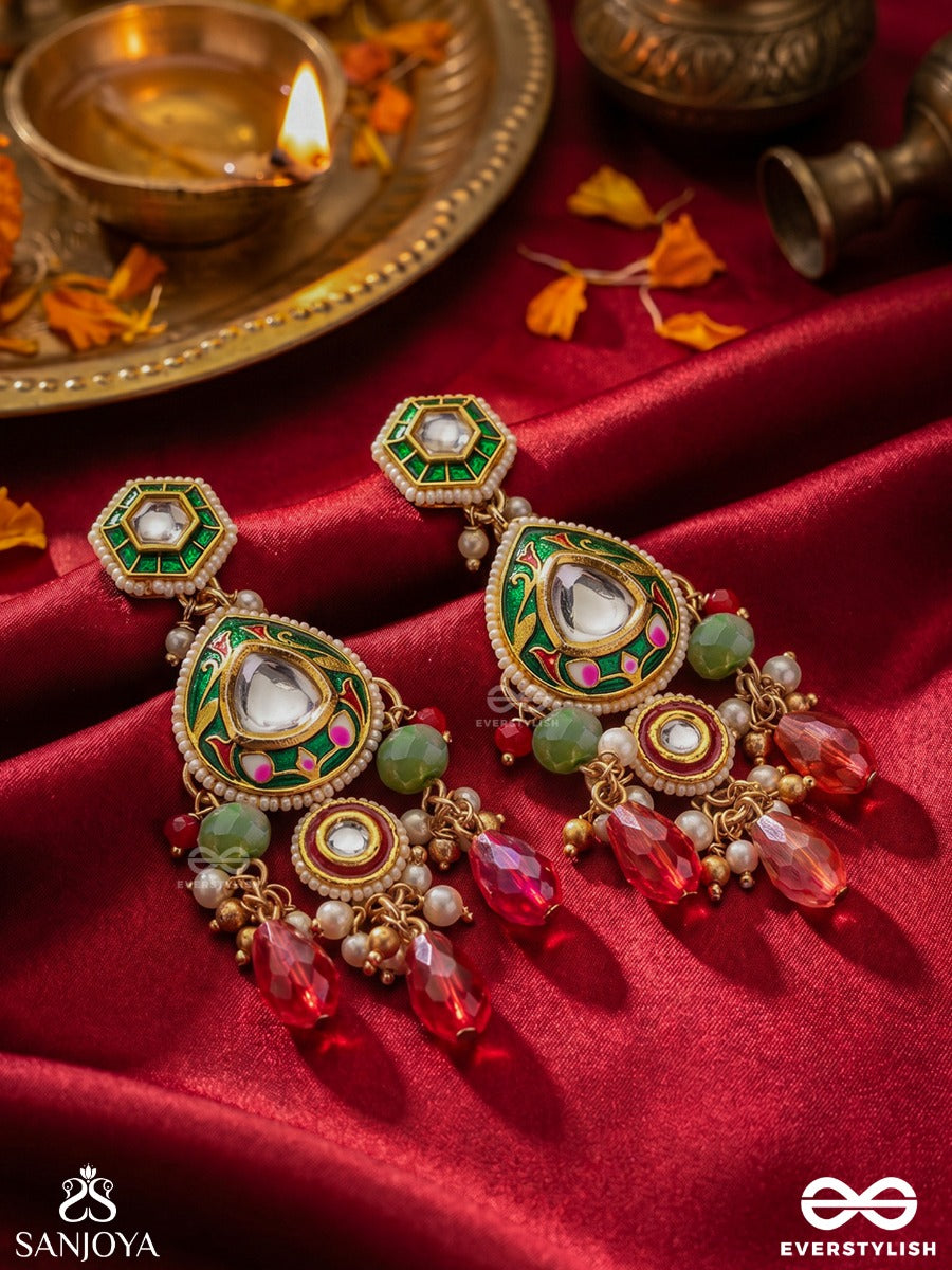 Manitarika - Jewelled Star - Decorative Earrings With Teardrop Design And Ruby Drop Accents