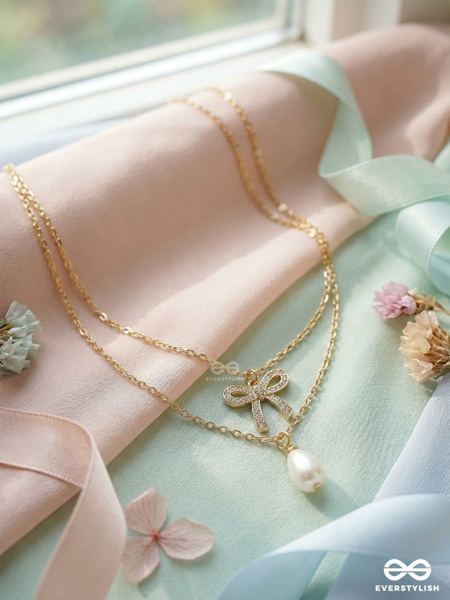 Pearl Whisper - Elegant Bow Necklace