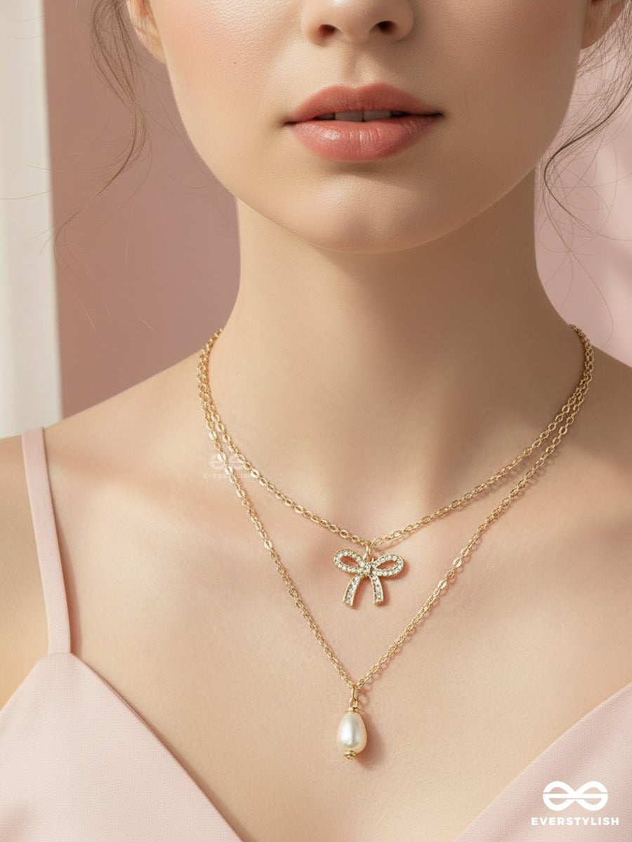 Pearl Whisper - Elegant Bow Necklace