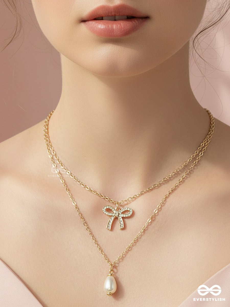 Pearl Whisper - Elegant Bow Necklace