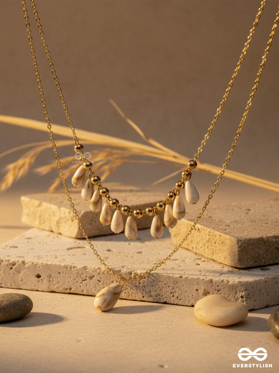 Tidal Glow - Layered Golden Sandstone Necklace With Natural Shell Drops
