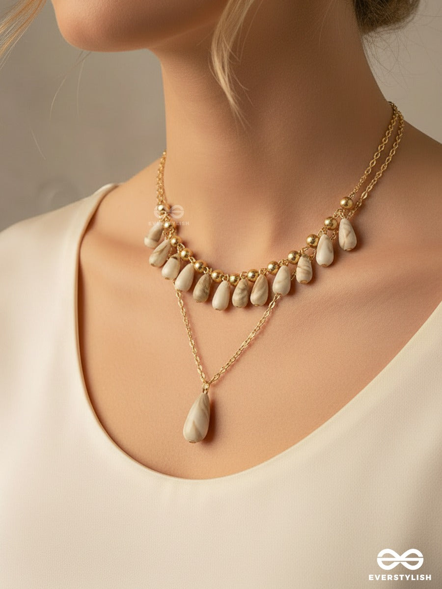 Tidal Glow - Layered Golden Sandstone Necklace With Natural Shell Drops
