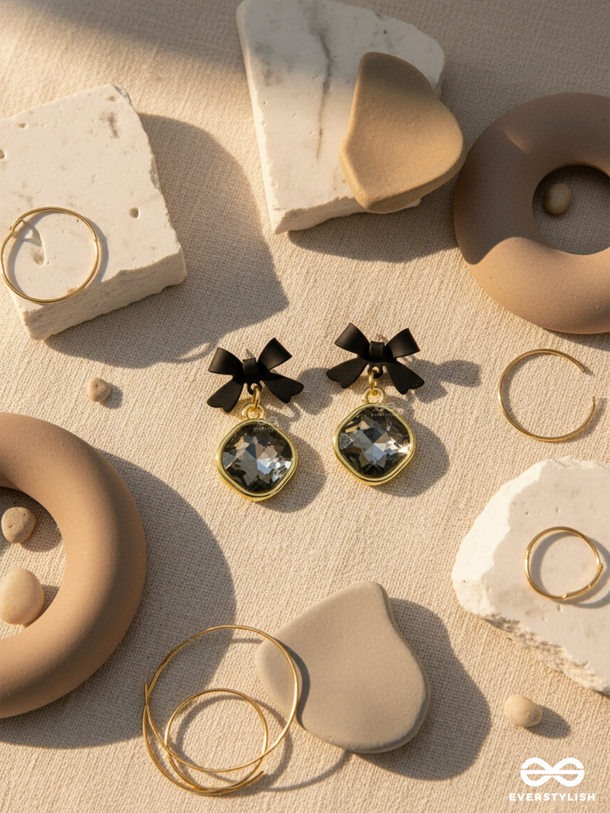 Night Whispers - Chic Bow Earrings With Glossy Black Gemstones