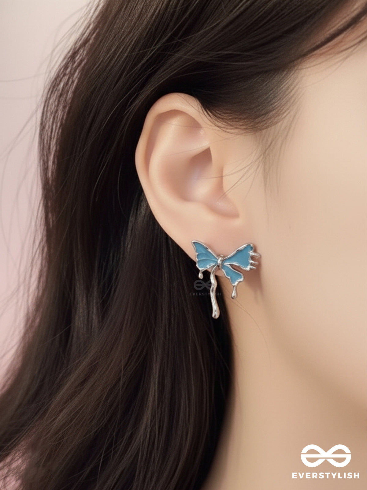 Frosty Fling - Playful Blue Bow Earrings