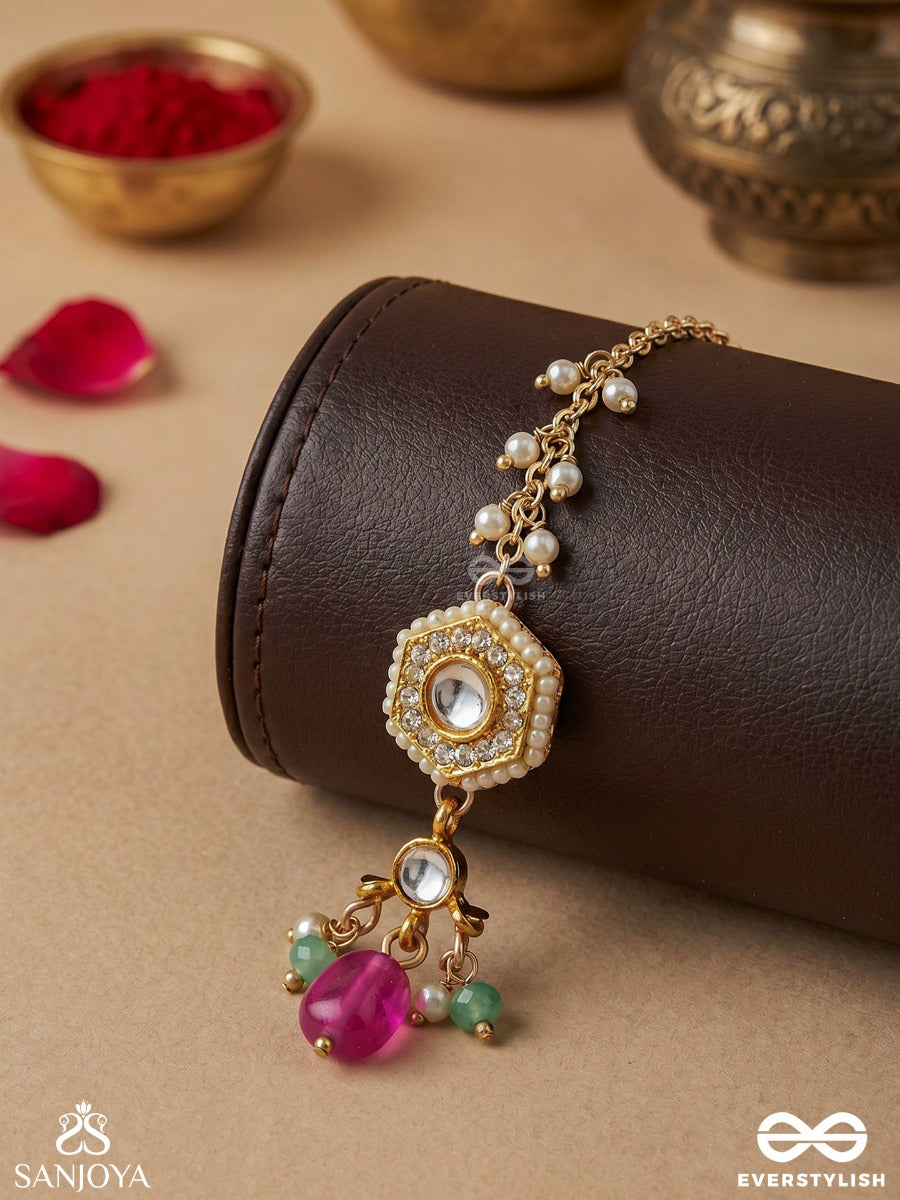 Tapanshri - Bright Ray - Gold Cutwork Motif With Reflective Stones And Pink Bead Maangtika