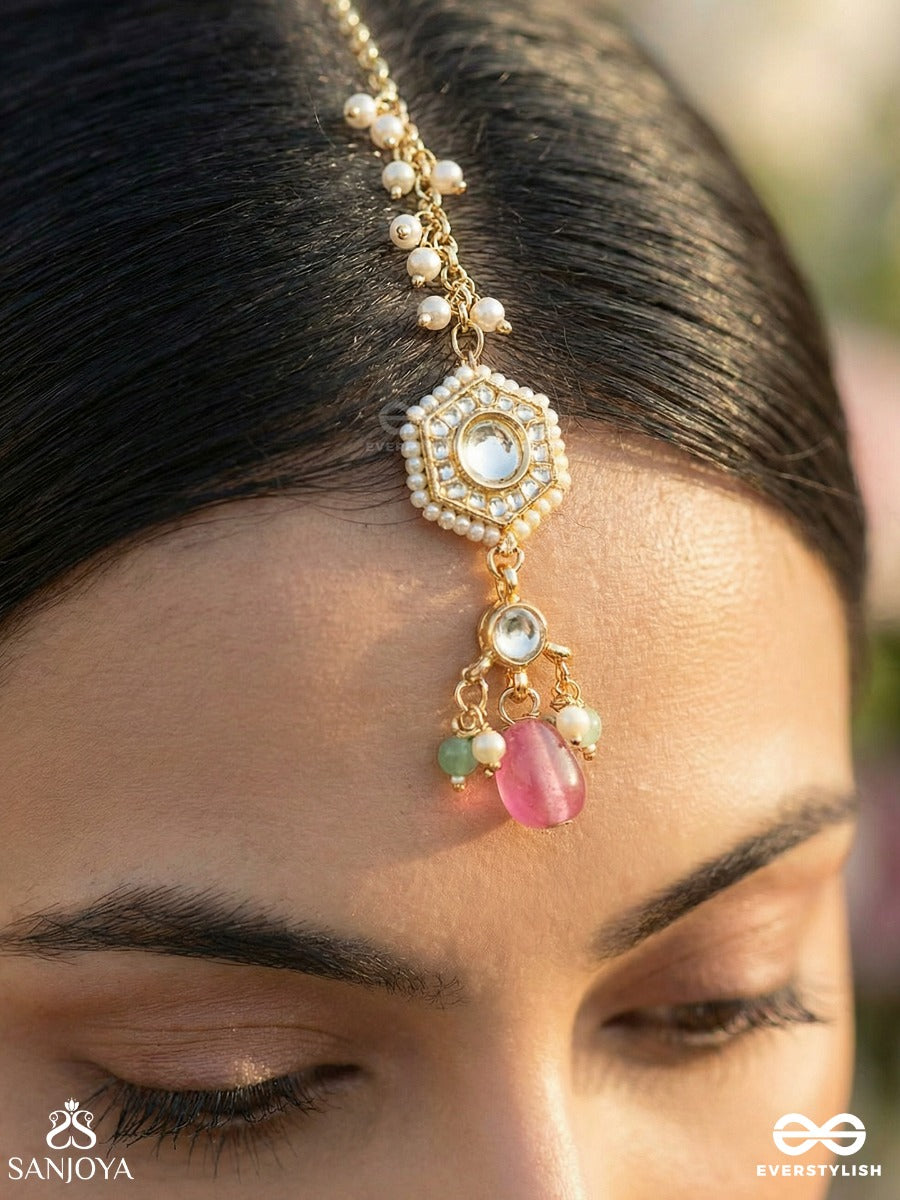 Tapanshri - Bright Ray - Gold Cutwork Motif With Reflective Stones And Pink Bead Maangtika