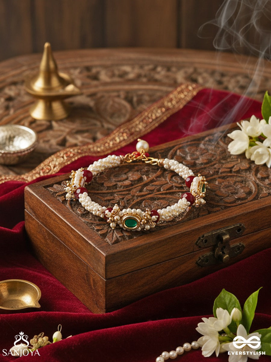 Saanvika - Softly Radiant - Delicate Pearl Bracelet Pair With Maroon Bead Accents And An Emerald-Tone Centre Detail