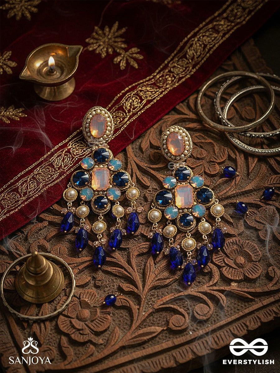 Neelrashmi - Ray Of Midnight Light - Statement Earrings With Sapphire-Tone Stones, Blush Centre Detail And Dramatic Drop Accents