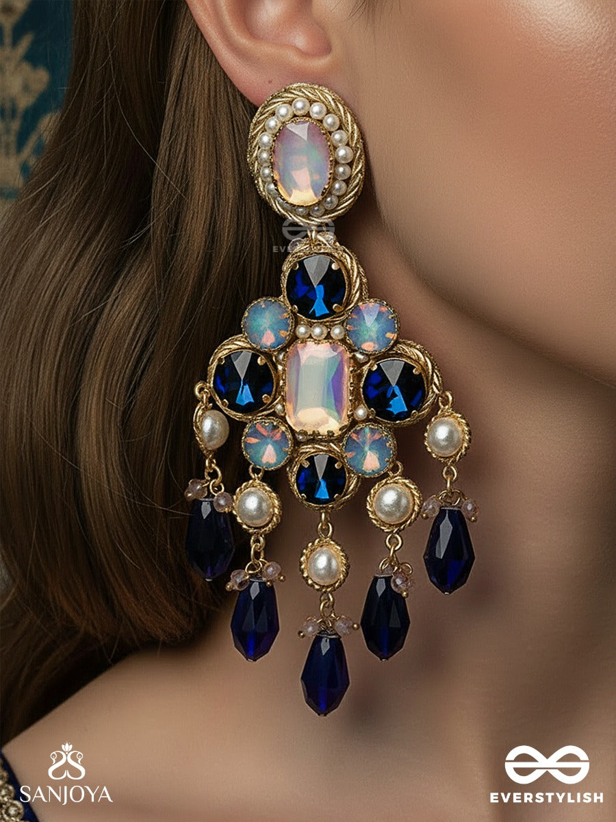 Neelrashmi - Ray Of Midnight Light - Statement Earrings With Sapphire-Tone Stones, Blush Centre Detail And Dramatic Drop Accents