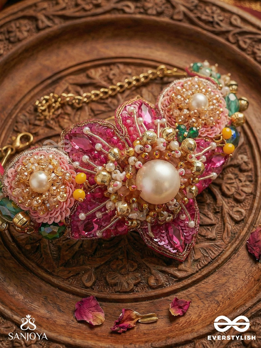 Anuraagini - Crimson Charm - Handcrafted Hair Bun Accessory With Pink Embroidered Petals And Pearl Accents