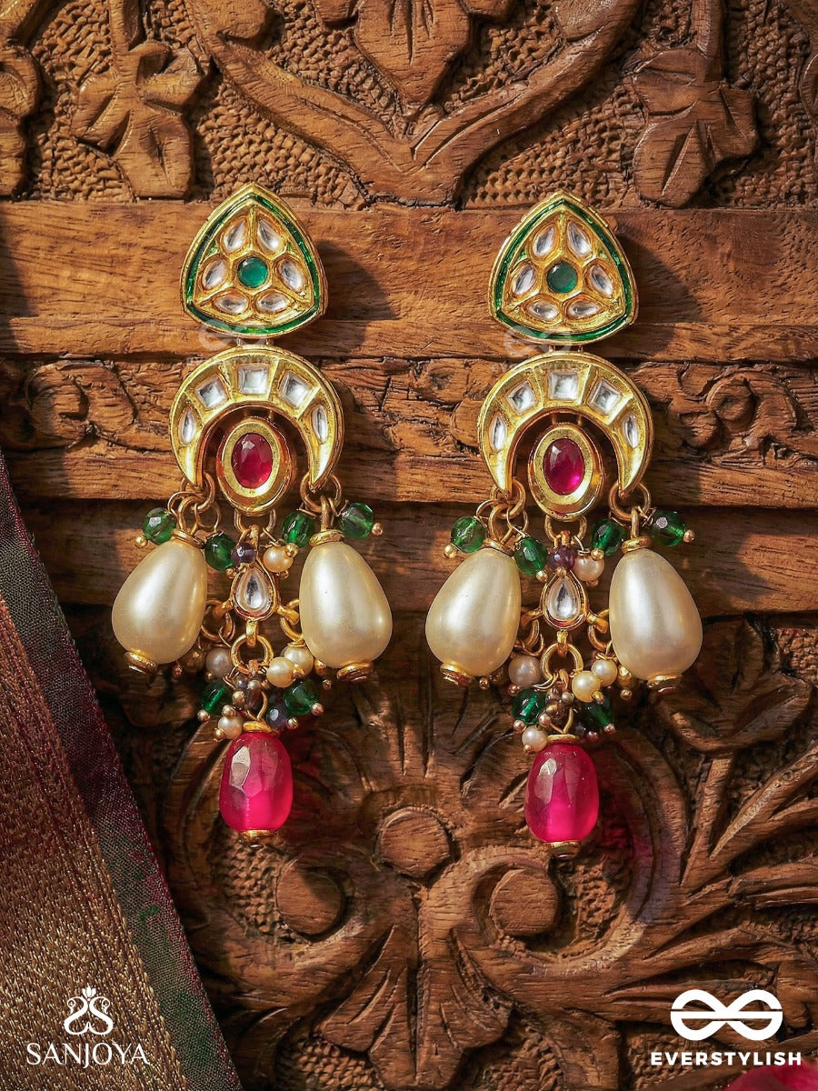 Shivanshi - Divine Trace - Kundan Arc Earrings With Crimson Oval Centre, Pearl Drops And Green Bead Accents