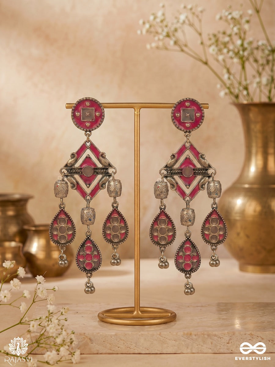Chandrang - Oxidised Earrings With Ornate Panels And Red Dangling Charms