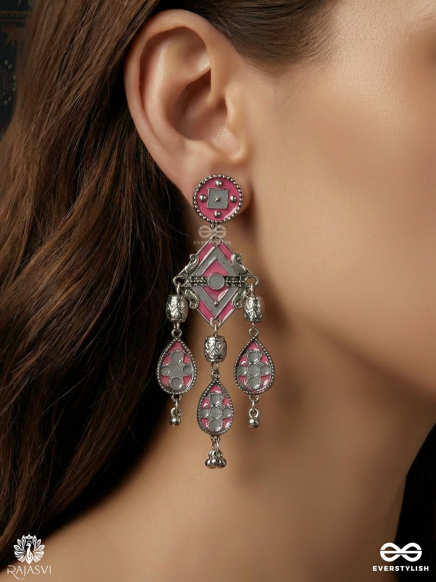 Chandrang - Oxidised Earrings With Ornate Panels And Red Dangling Charms