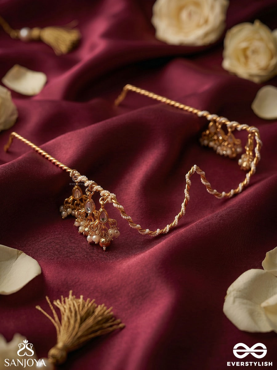 Raunaki – Festive Glow – Statement Face Let With Layered Chains And Shimmering Floral Embellishments