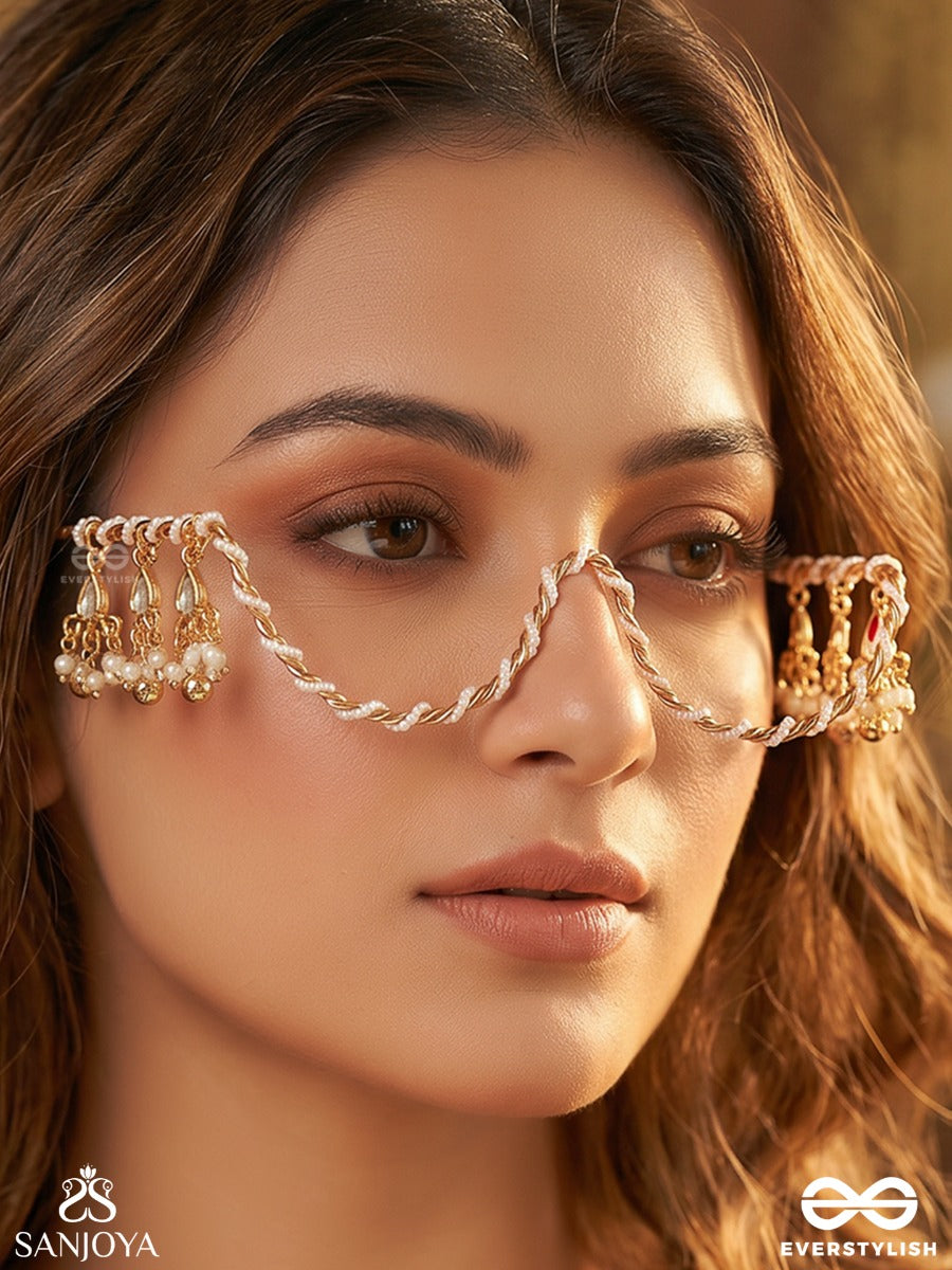 Raunaki – Festive Glow – Statement Face Let With Layered Chains And Shimmering Floral Embellishments