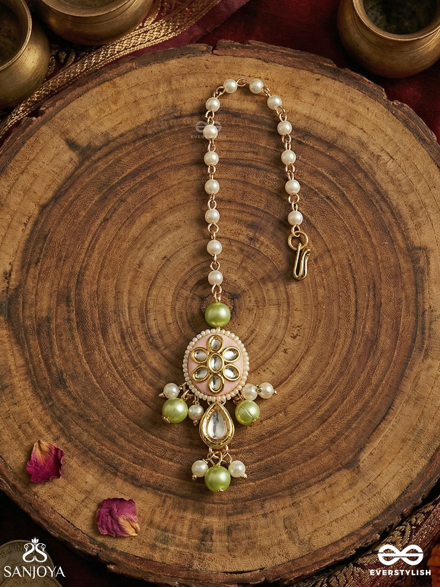 Vasukamini - Treasured Beauty - Elegant Maangtika With Gemmed Bloom And Green Bead Details