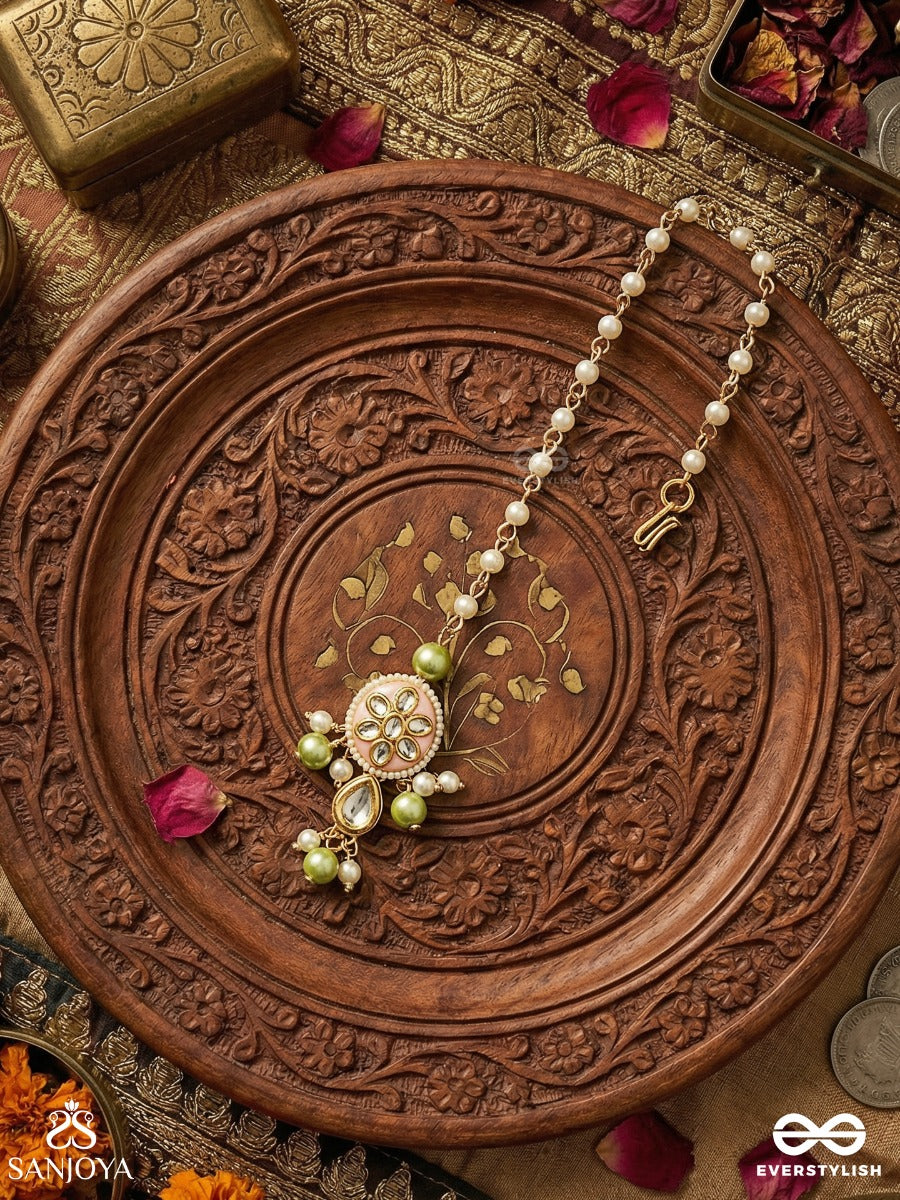 Vasukamini - Treasured Beauty - Elegant Maangtika With Gemmed Bloom And Green Bead Details
