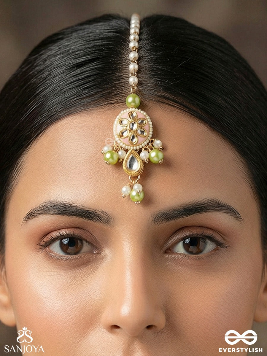 Vasukamini - Treasured Beauty - Elegant Maangtika With Gemmed Bloom And Green Bead Details