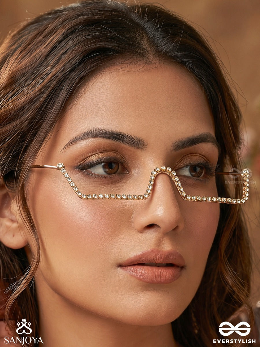Tarakshi – Starlit Shine – Minimal Rhinestone Face Let With A Sleek Sculpted Wave Design