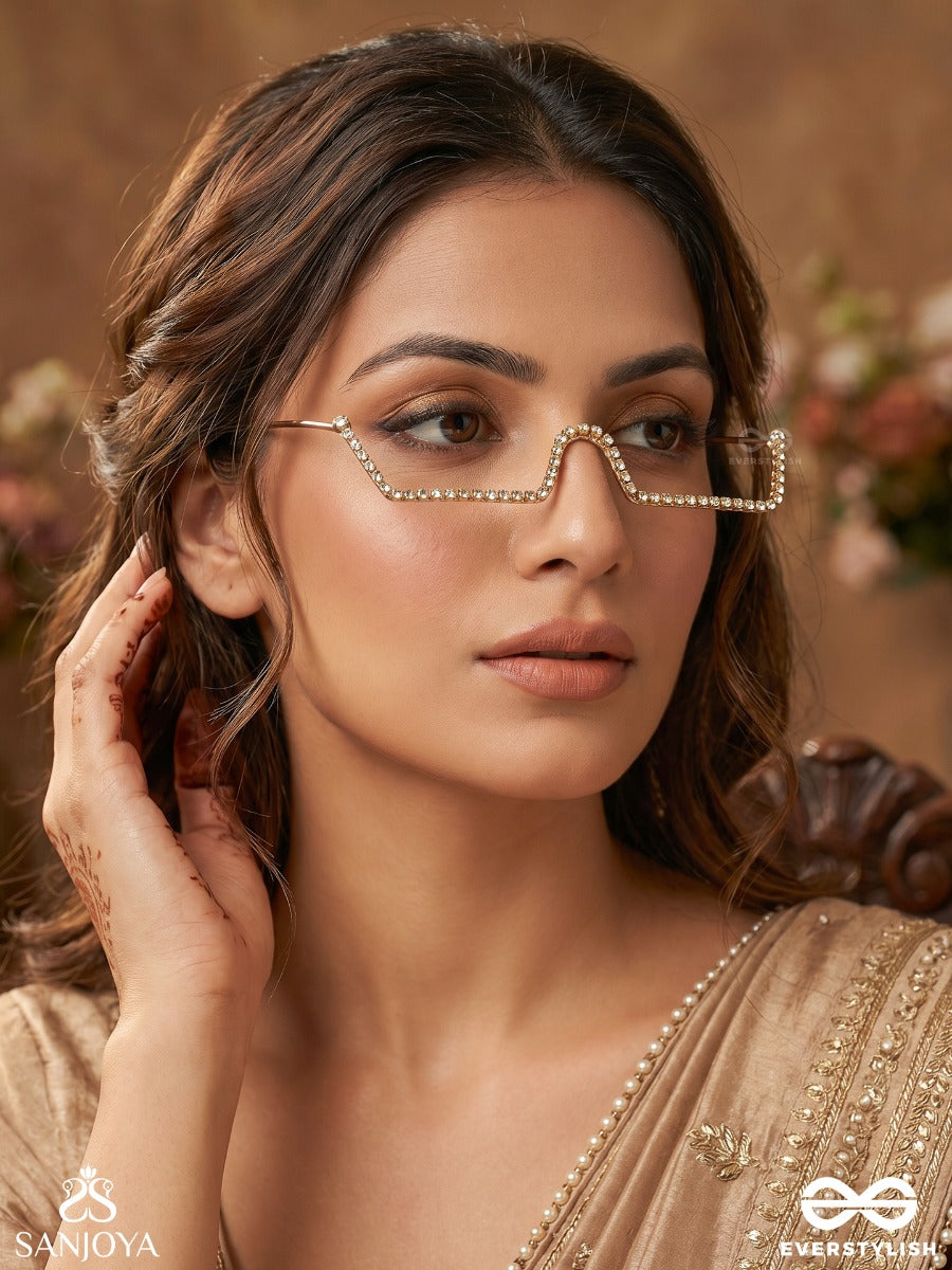 Tarakshi – Starlit Shine – Minimal Rhinestone Face Let With A Sleek Sculpted Wave Design