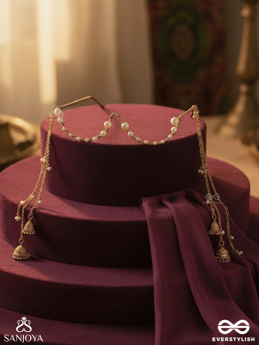 Lavanyika – Royal Shimmer – Statement Face Let With Draped Pearl Chains And Dangling Gold Tassel Drops