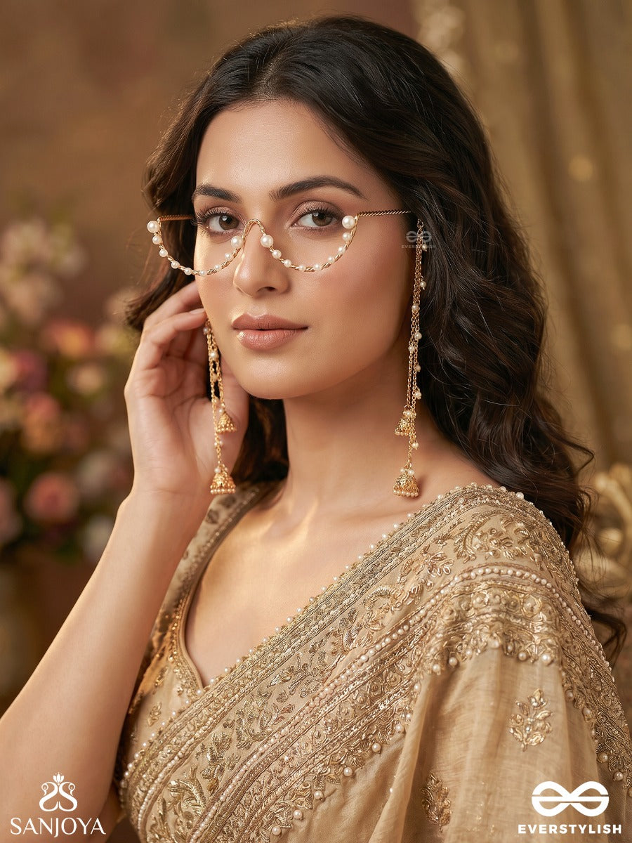 Lavanyika – Royal Shimmer – Statement Face Let With Draped Pearl Chains And Dangling Gold Tassel Drops