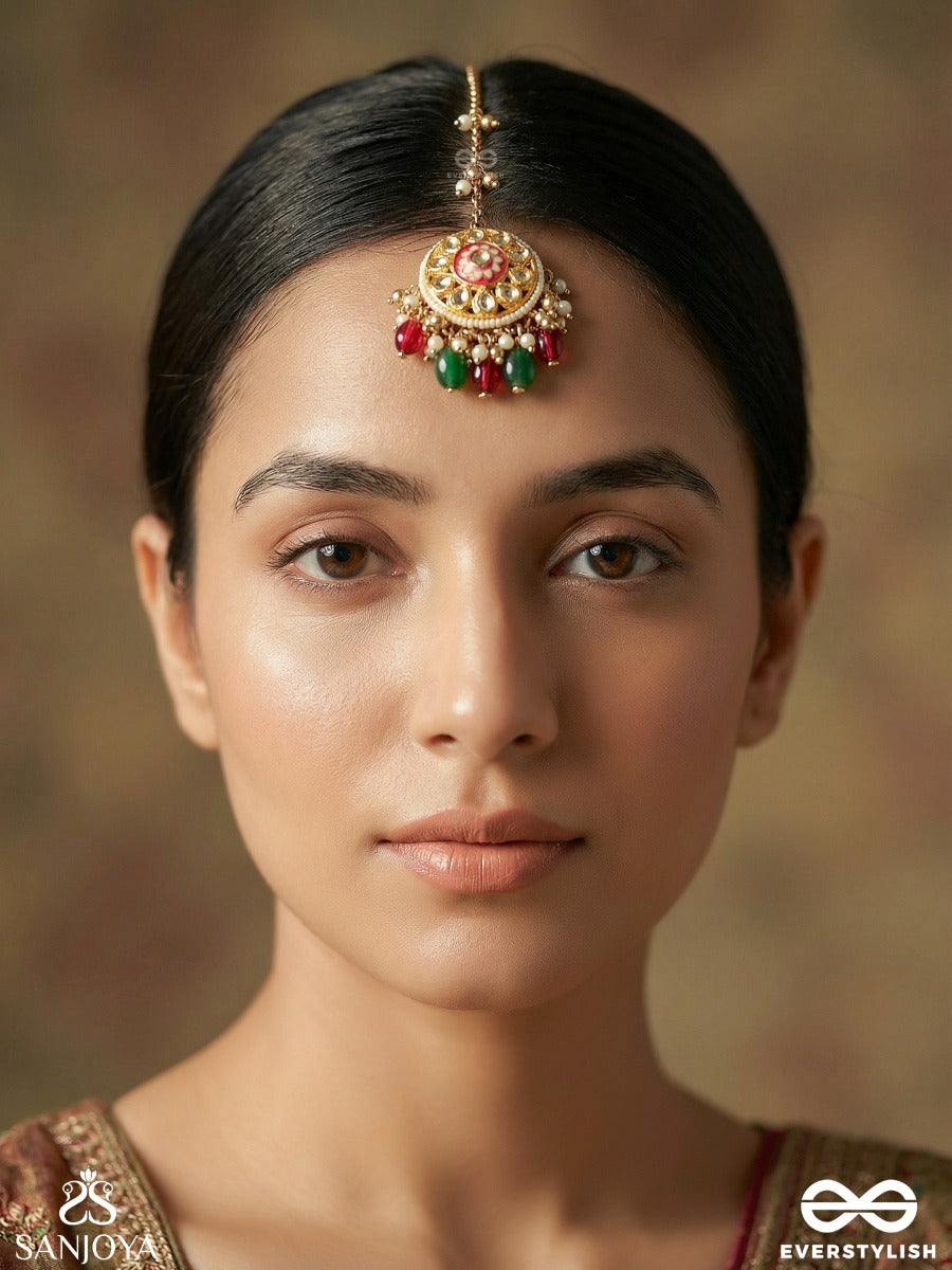 Kanakchitrini - Golden Artistry - Delicate Maangtika With Ornamental Disc, Gem Details And Dangling Accents