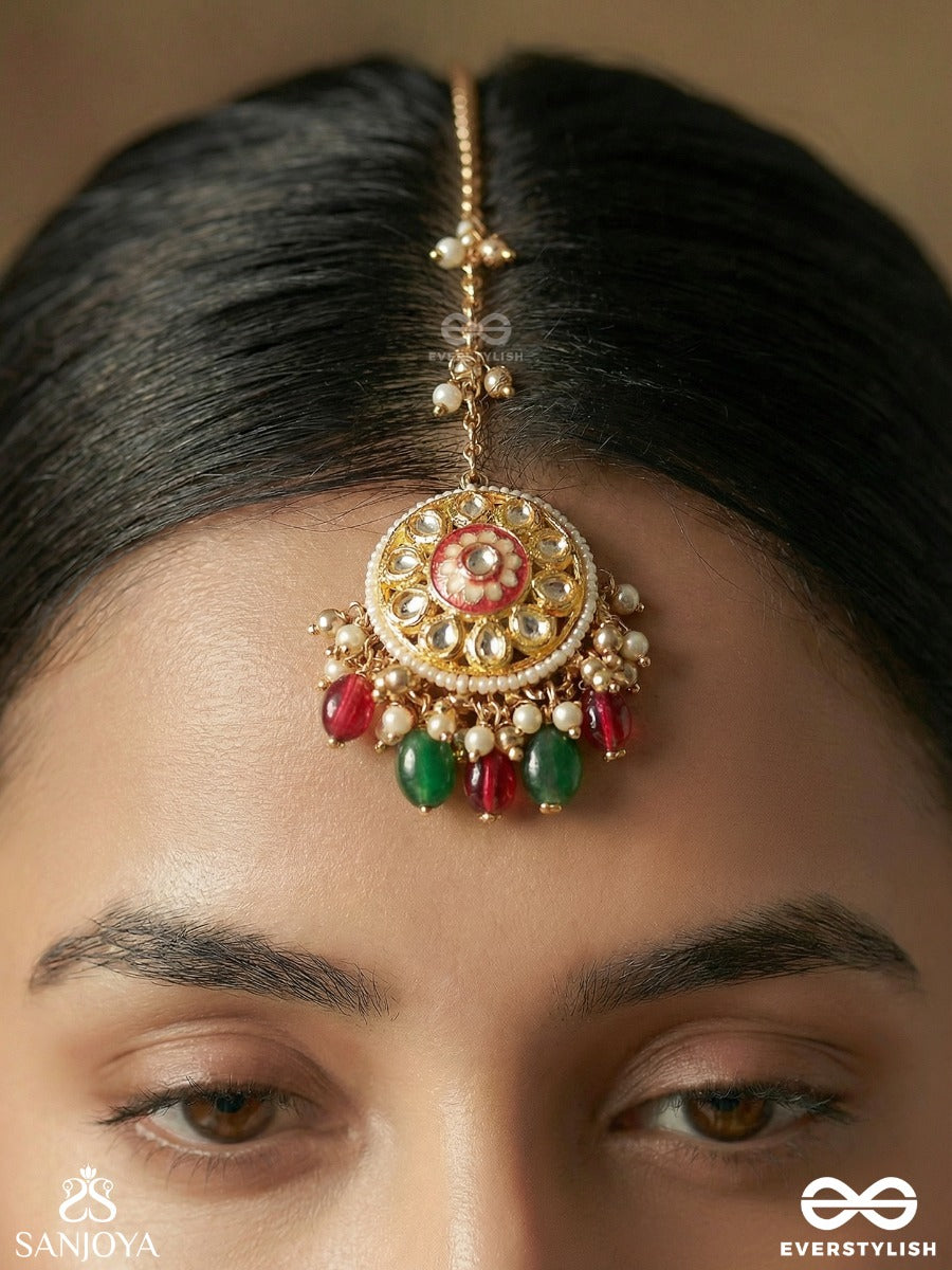 Kanakchitrini - Golden Artistry - Delicate Maangtika With Ornamental Disc, Gem Details And Dangling Accents