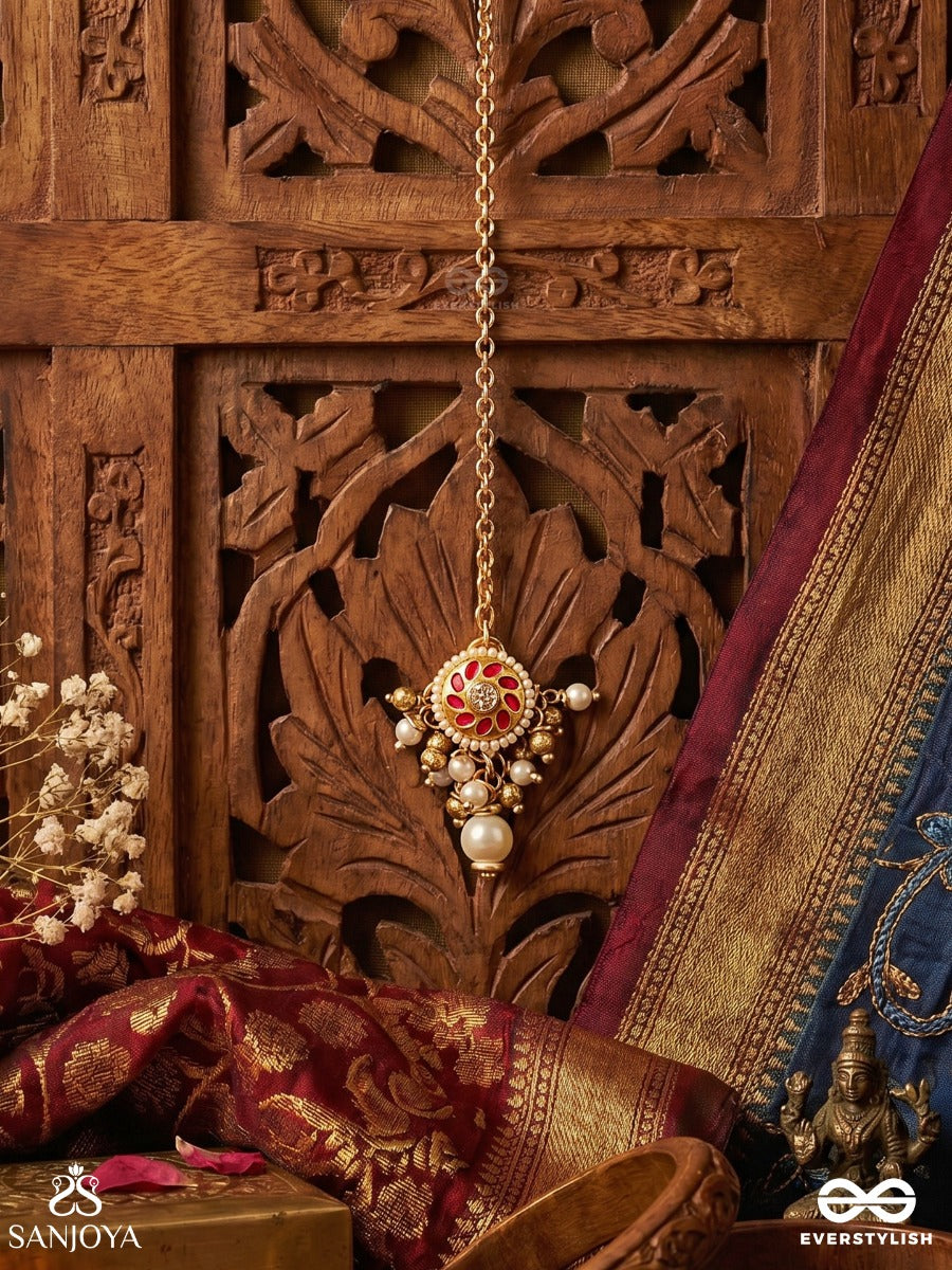 Vasupratika - Treasure Emblem - Delicate Maangtika With Enamelled Medallion, Gem Detailing And Pearl Drop Accent