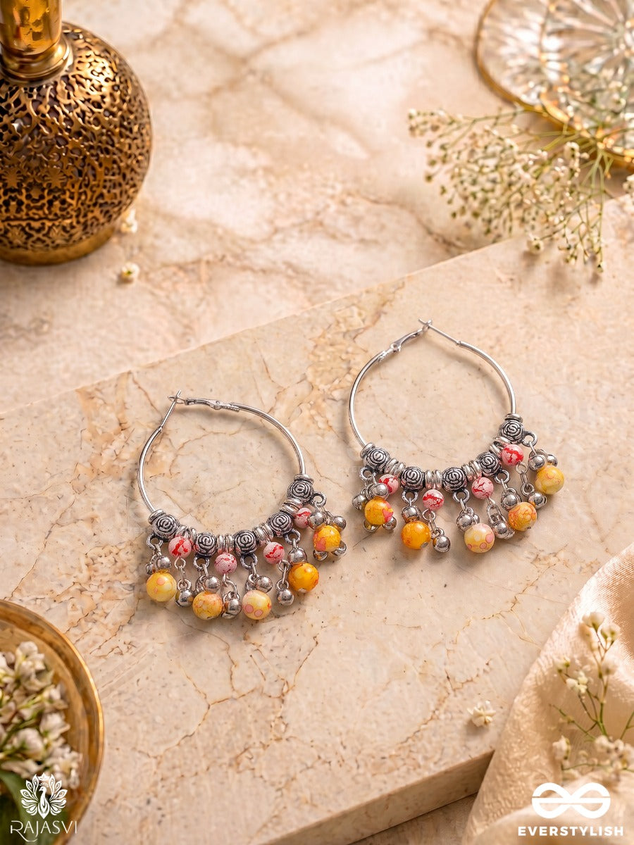 Ravya Tinkle - Dangle Hoop Earrings