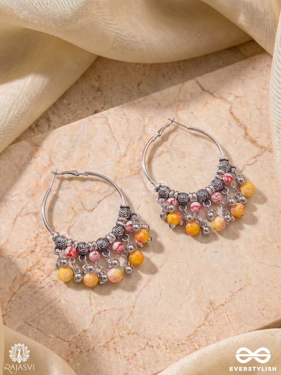 Ravya Tinkle - Dangle Hoop Earrings