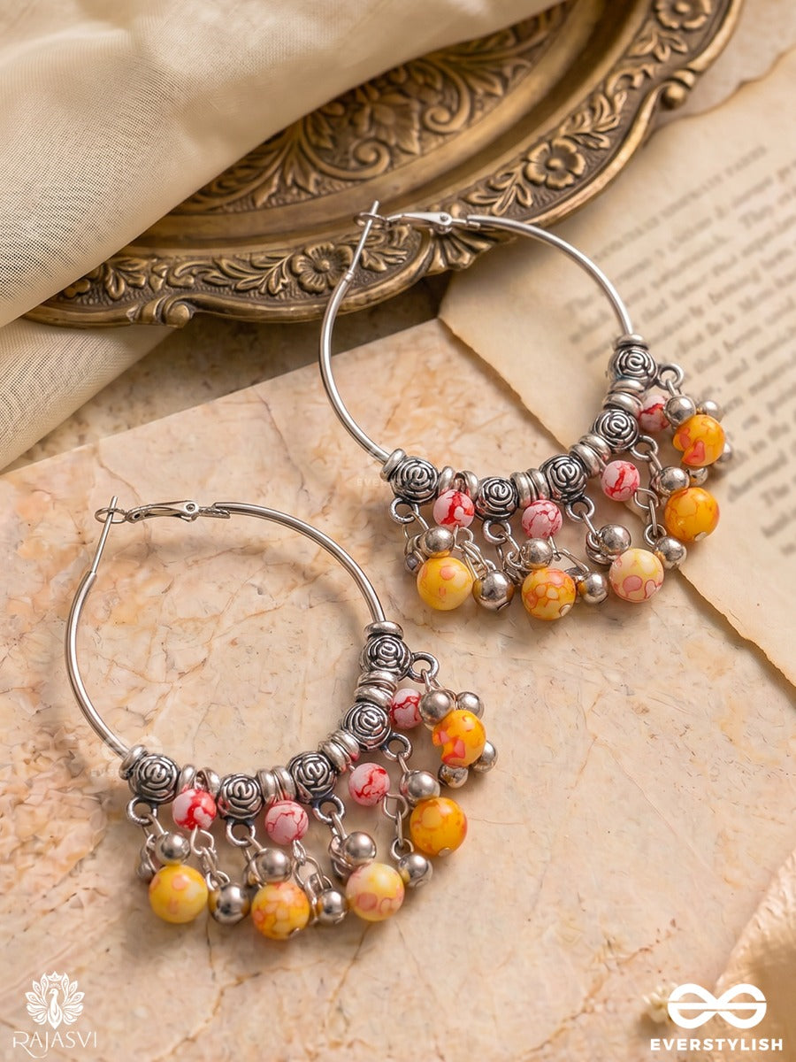 Ravya Tinkle - Dangle Hoop Earrings