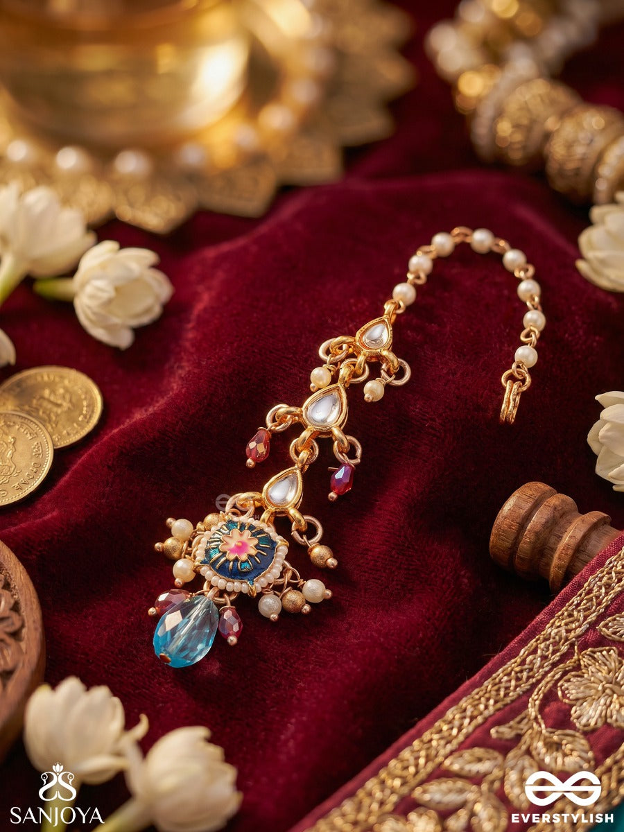 Mehranjali – Offering Of Radiance – Delicate Maangtika With Embellished Motifs, Flowing Details And Dangling Gem Accents