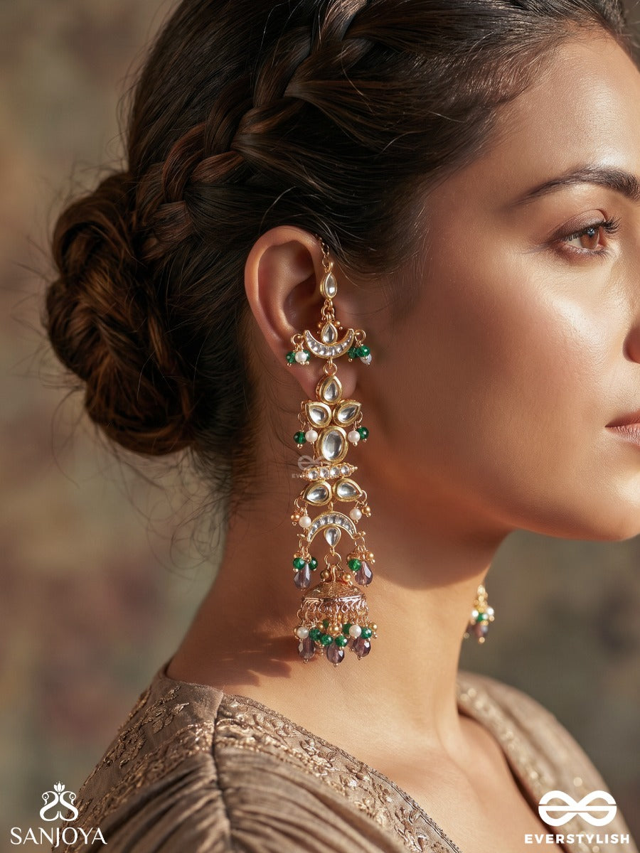 Ojasvini – Radiant Splendour – Straight Kaan Chain Earrings With Leaf-Like Stone Motifs, Deep Blue Accents, Pearl Details And Ornate Hanging Jhumka Ends