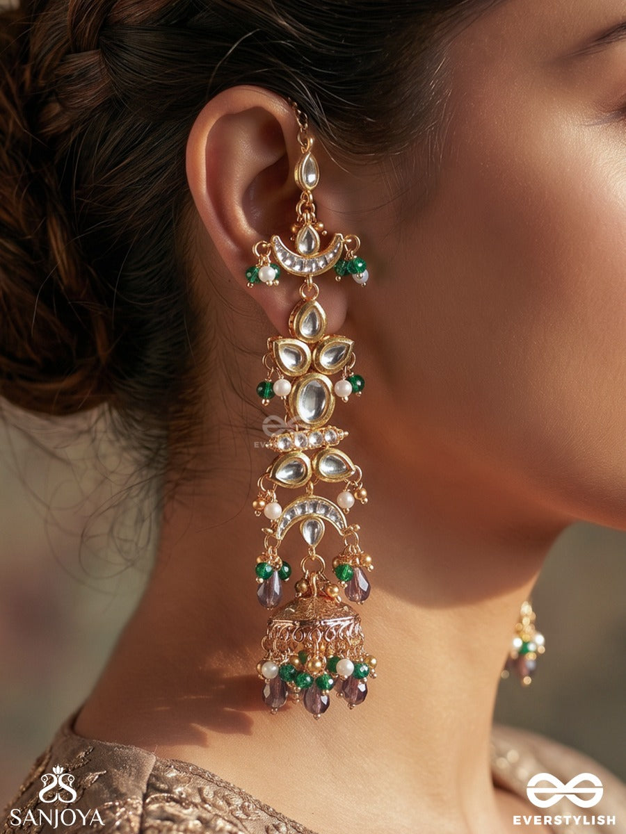 Ojasvini – Radiant Splendour – Straight Kaan Chain Earrings With Leaf-Like Stone Motifs, Deep Blue Accents, Pearl Details And Ornate Hanging Jhumka Ends