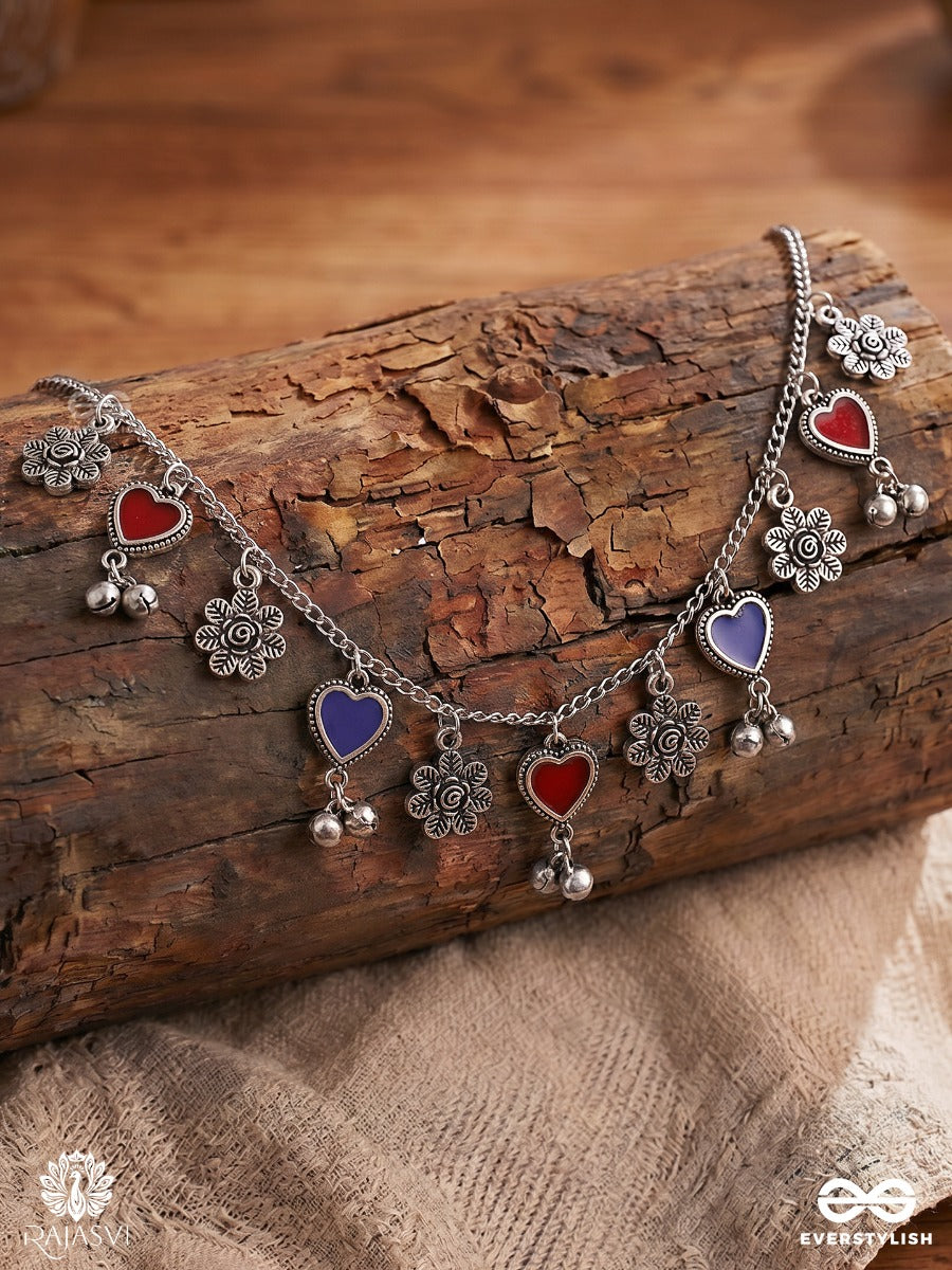 Mohini Taal - Oxidised Necklace With Heart Charms, Floral Links And Ghungroo Drops