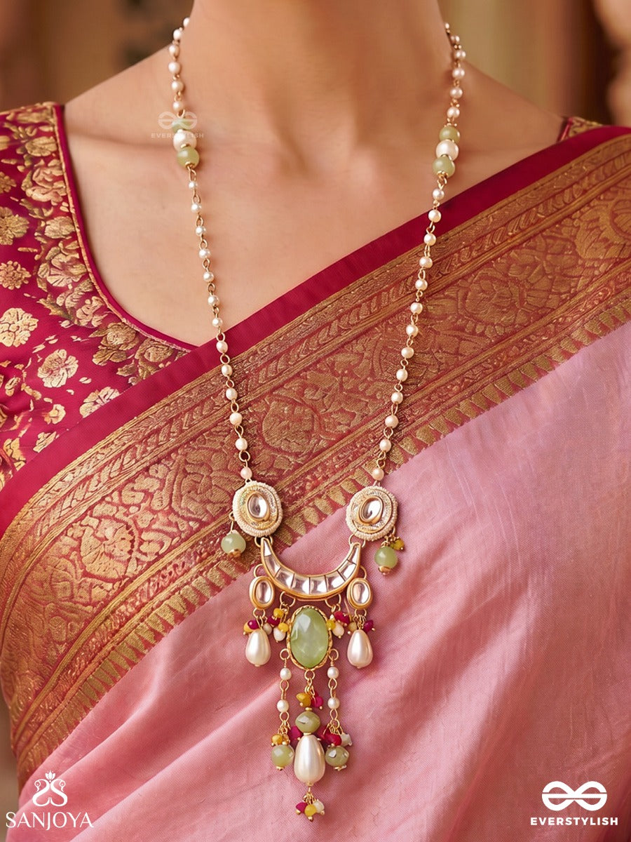 Taraleena – Flowing Beauty – Festive Necklace With Decorative Green Detail, Curved Side Motifs And Colourful Drop Accents