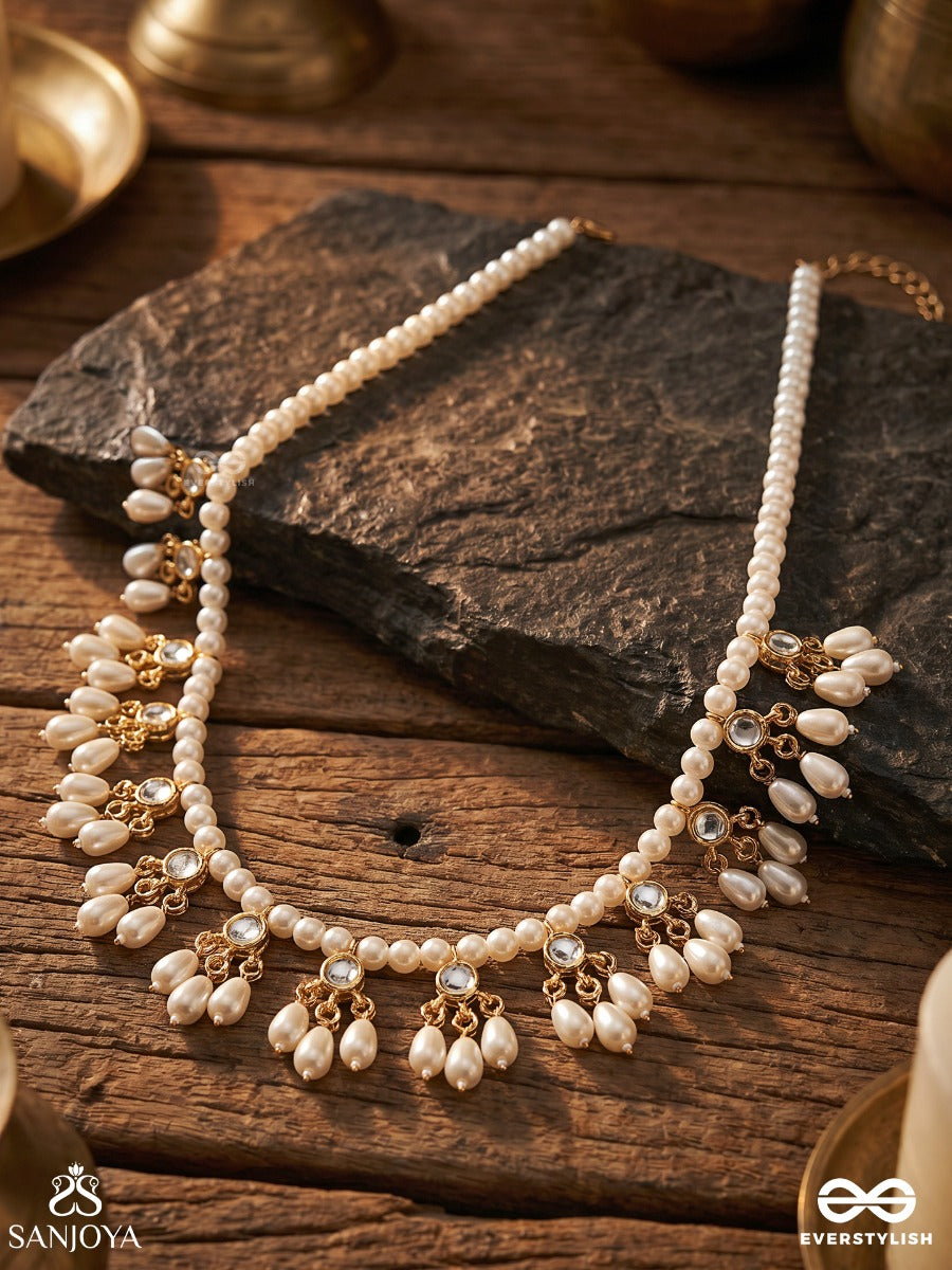 Pushpavahi – Flow Of Blossoms – Elegant Necklace With Pearl-Lined Strands, Floral Petal Clusters And Delicate Gold-Tone Detailing