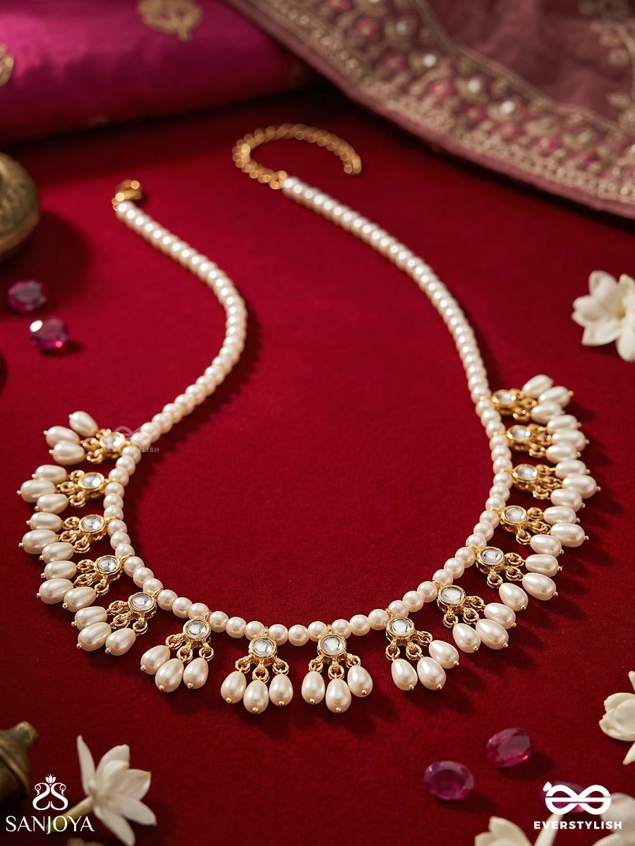 Pushpavahi – Flow Of Blossoms – Elegant Necklace With Pearl-Lined Strands, Floral Petal Clusters And Delicate Gold-Tone Detailing