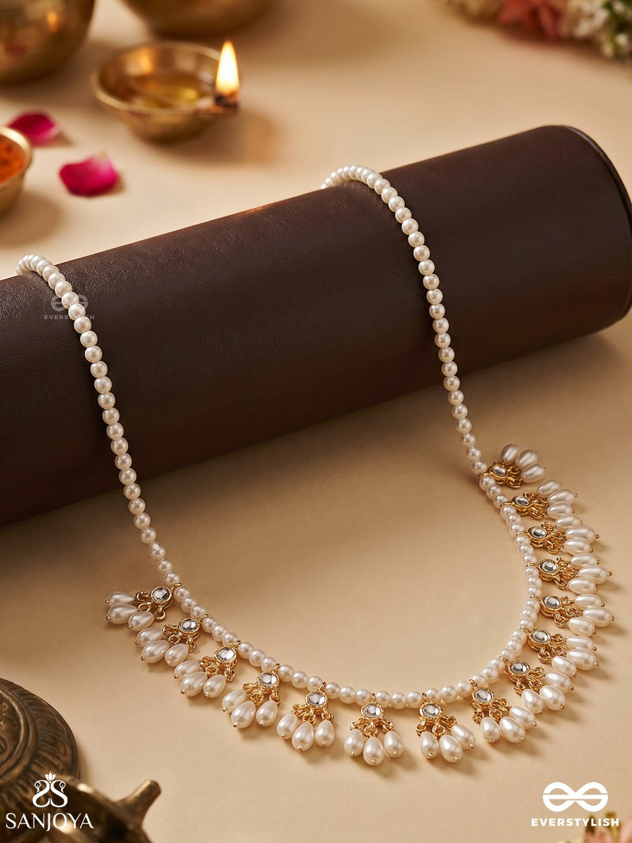 Pushpavahi – Flow Of Blossoms – Elegant Necklace With Pearl-Lined Strands, Floral Petal Clusters And Delicate Gold-Tone Detailing