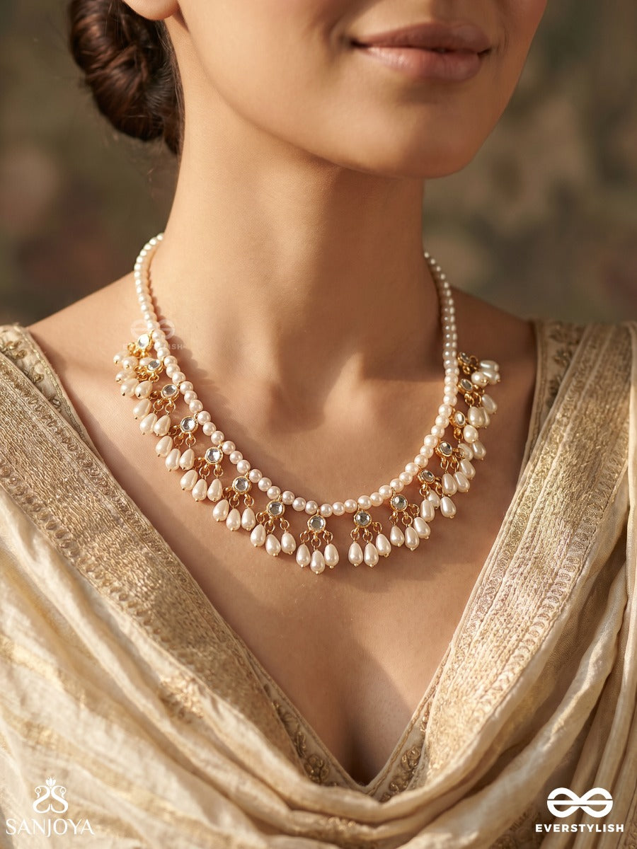 Pushpavahi – Flow Of Blossoms – Elegant Necklace With Pearl-Lined Strands, Floral Petal Clusters And Delicate Gold-Tone Detailing
