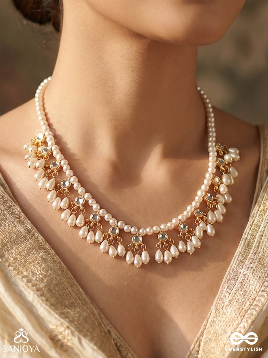 Pushpavahi – Flow Of Blossoms – Elegant Necklace With Pearl-Lined Strands, Floral Petal Clusters And Delicate Gold-Tone Detailing